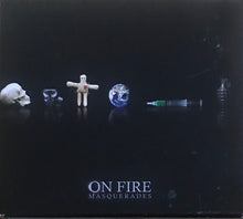 On Fire : Masquerades (CD, Album)